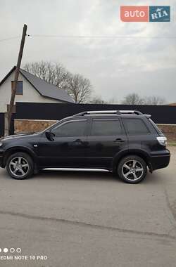 Внедорожник / Кроссовер Mitsubishi Outlander 2006 в 