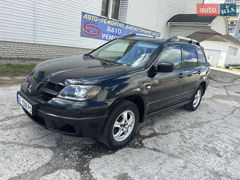 Внедорожник / Кроссовер Mitsubishi Outlander 2004 в 