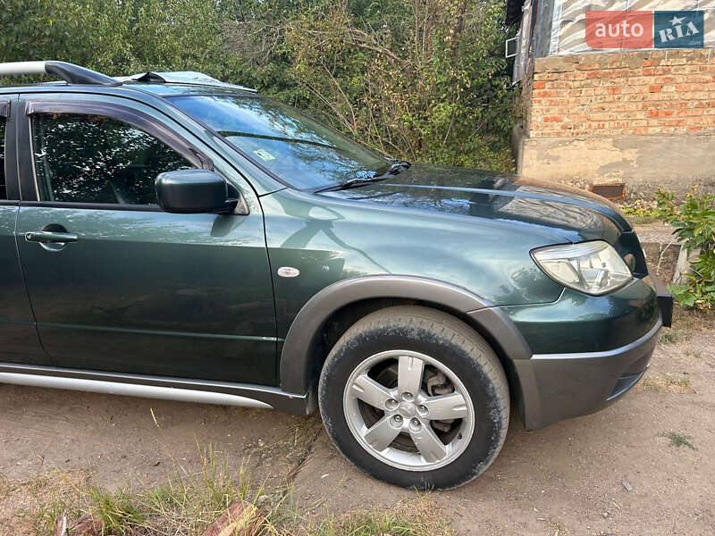 Внедорожник / Кроссовер Mitsubishi Outlander 2006 в Киеве фото 15 Внедорожник / Кроссовер Mitsubishi Outlander 2006 в Киеве