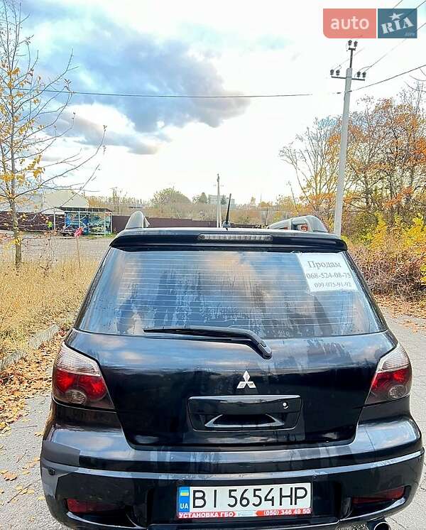 Внедорожник / Кроссовер Mitsubishi Outlander 2005 в Полтаве фото 4 Внедорожник / Кроссовер Mitsubishi Outlander 2005 в Полтаве