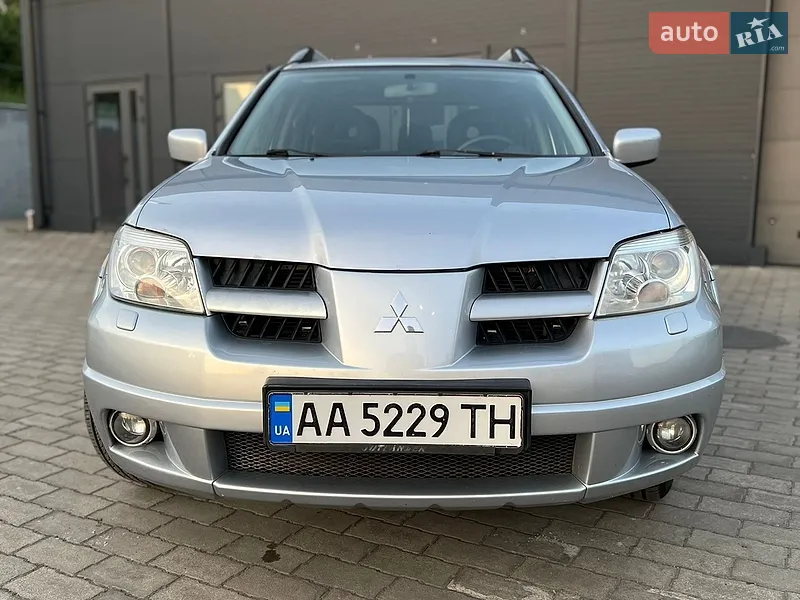 Mitsubishi Outlander 2006 VIN JMBXRCU5W7U000678 фото оголошення 3 з 153