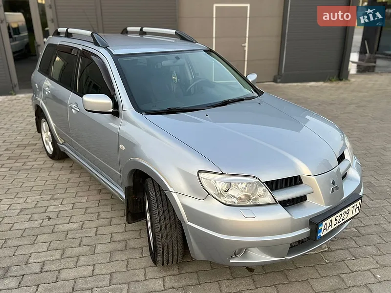 Mitsubishi Outlander 2006 VIN JMBXRCU5W7U000678 фото оголошення 6 з 153
