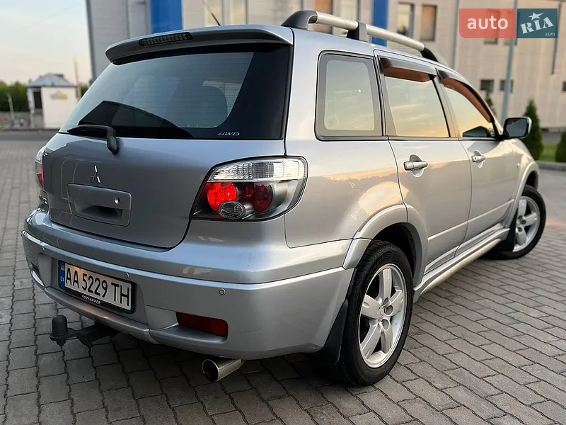 Mitsubishi Outlander 2006 VIN JMBXRCU5W7U000678 фото оголошення 17 з 153