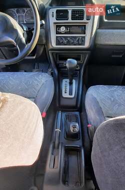 Внедорожник / Кроссовер Mitsubishi Pajero Pinin 1999 в 