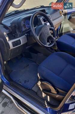 Внедорожник / Кроссовер Mitsubishi Pajero Pinin 2002 в 