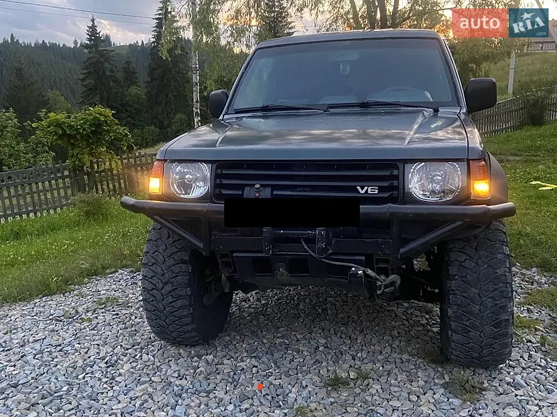Mitsubishi Pajero 1997 VIN JMB0NV430MJ001219 фото оголошення 3 з 36