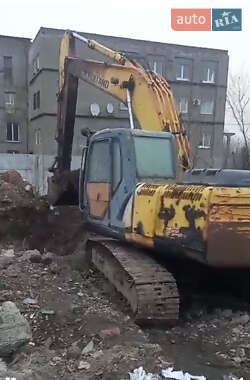 Гусеничный экскаватор New Holland E 215B 2008 в 