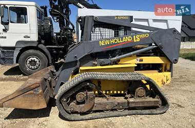 Минипогрузчик New Holland E 215B 2005 в 