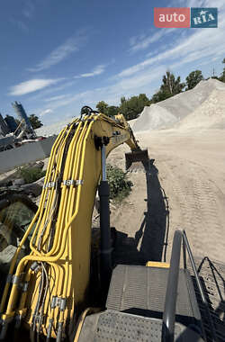 Екскаватор навантажувач New Holland E 305 2013 в 