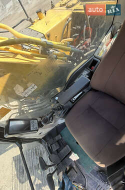Екскаватор навантажувач New Holland E 305 2013 в 