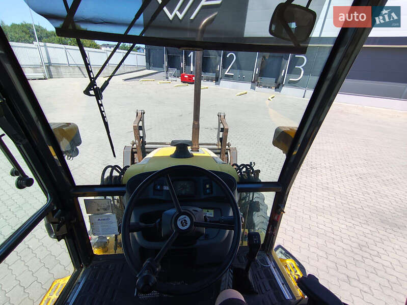 Екскаватор навантажувач New Holland LB95B-4PT 2003 в Львові