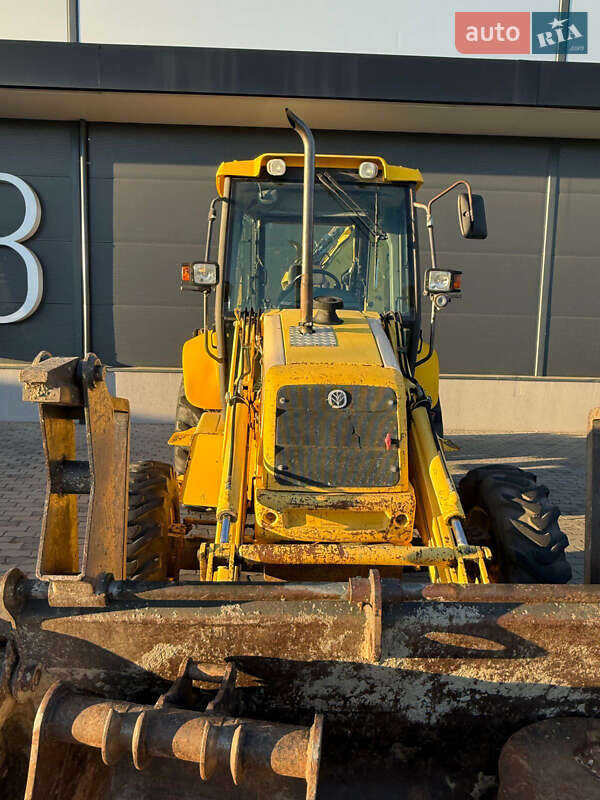 Екскаватор навантажувач New Holland LB95B-4PT 2003 в Львові