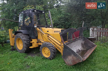 Экскаватор погрузчик New Holland LB 1995 в 