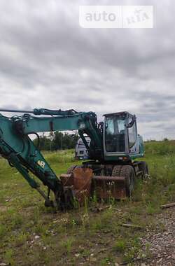 Колесный экскаватор New Holland MH 3.6 2007 в Львове