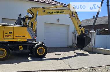 Колесный экскаватор New Holland MH 3.6 2009 в 
