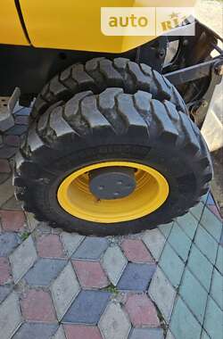Колесный экскаватор New Holland MH 3.6 2009 в 