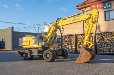 Колесный экскаватор New Holland MH 3.6 2003 в 