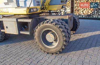 Колесный экскаватор New Holland MH 3.6 2003 в 