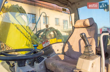 Колесный экскаватор New Holland MH 3.6 2003 в 