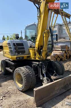 Екскаватор навантажувач New Holland MH 3.6 2007 в 
