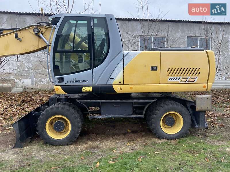 Колесный экскаватор New Holland MH 6.6 2005 в 