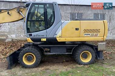 Колесный экскаватор New Holland MH 6.6 2005 в 