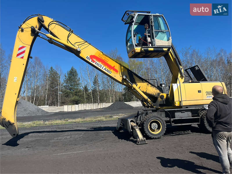 Колесный экскаватор New Holland MH 6.6 2005 в 