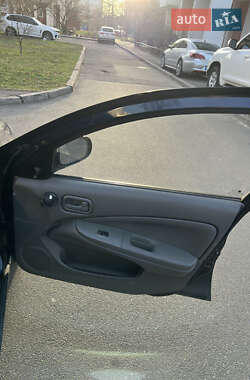 Седан Nissan Almera 2010 в 