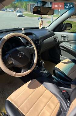 Седан Nissan Almera 2012 в 
