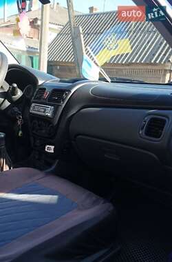 Седан Nissan Almera 2004 в 