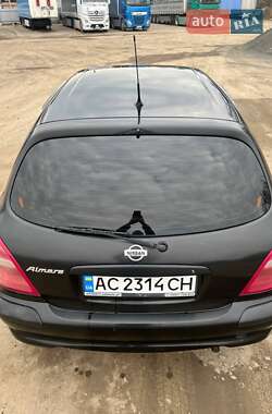 Хэтчбек Nissan Almera 2001 в 