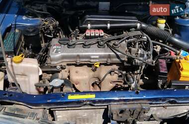 Хэтчбек Nissan Almera 1998 в 