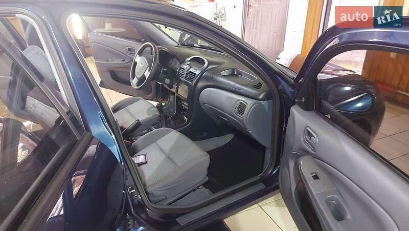 Седан Nissan Almera 2007 в Остер