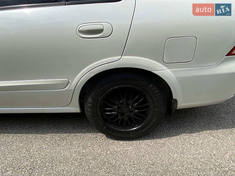 Седан Nissan Almera 2012 в Тернополе