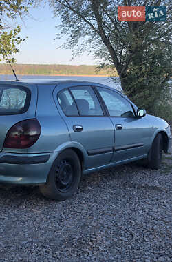 Хетчбек Nissan Almera 2000 в 