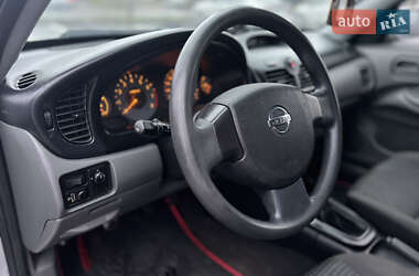 Седан Nissan Almera 2010 в 