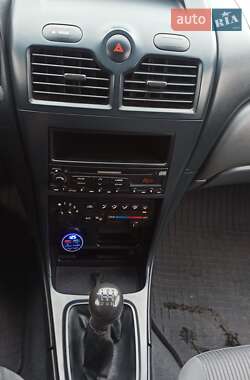 Седан Nissan Almera 2006 в  фото 19 Седан Nissan Almera 2006 в