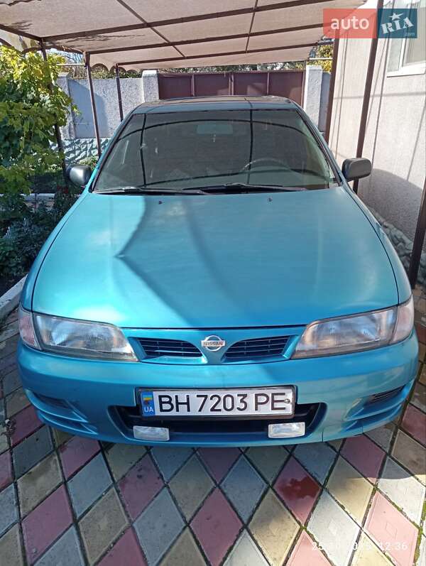 Хэтчбек Nissan Almera 1997 в  фото Хэтчбек Nissan Almera 1997 в