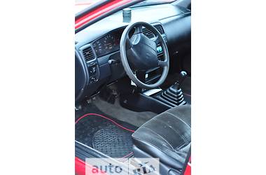 Хэтчбек Nissan Almera 1996 в 