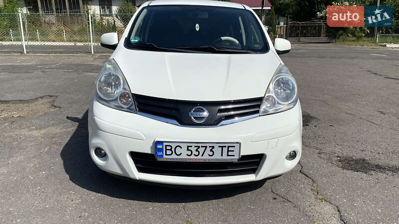 2010 Nissan Note, VIN SJNFAAE11U2075410:plate — фото 1 (autoria)