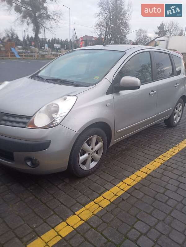2006 Nissan Note, VIN SJNFAAE11U1089241:plate — фото 1 (autoria)