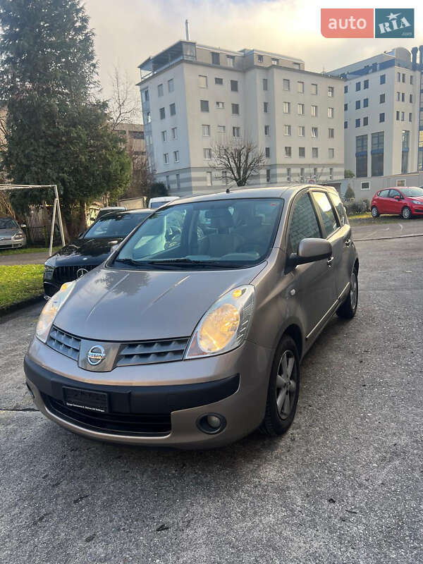 2006 Nissan Note, VIN SJNECAE11U1027542:plate — фото 1 (autoria)