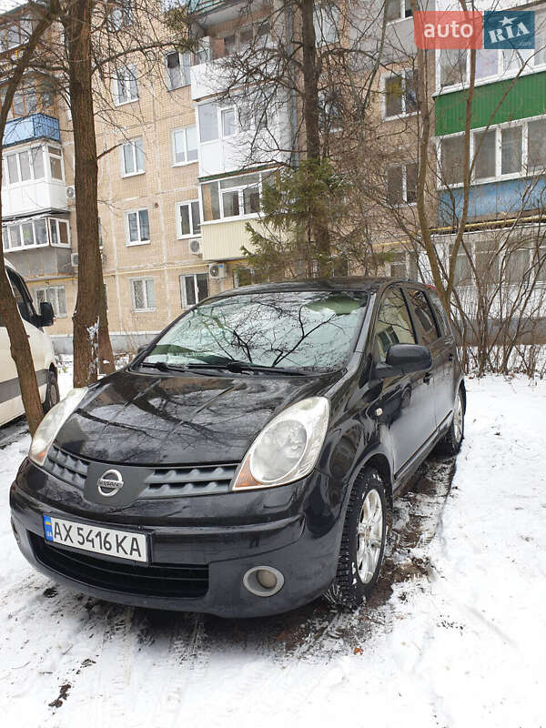2007 Nissan Note, VIN SJNFCAE11U1207671:plate — photo 1 (autoria)