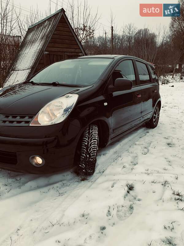 2007 Nissan Note, VIN SJNFAAE11U1210952:plate — фото 1 (autoria)