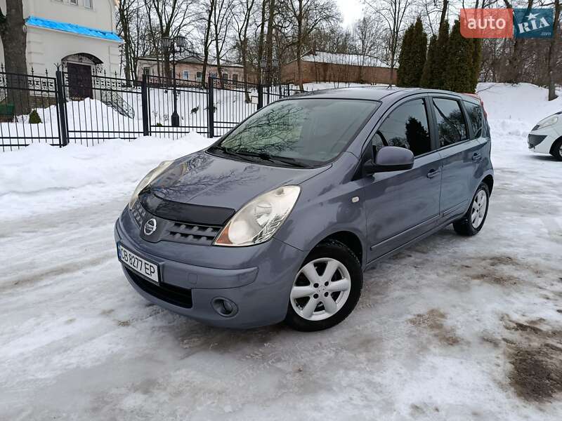 2009 Nissan Note, VIN SJNFDAE11U1307812:plate — фото 1 (autoria)