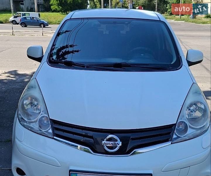 2012 Nissan Note, VIN SJNFCAE11U2155291:plate — фото 1 (autoria)