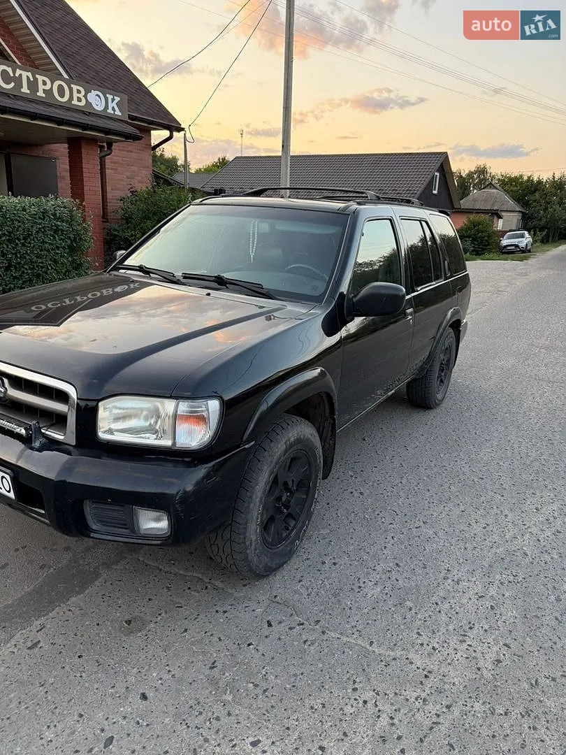 Nissan Pathfinder 2013 VIN VSKJVWR51U0537390 фото оголошення 4 з 20