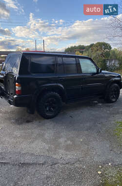 Внедорожник / Кроссовер Nissan Patrol 2003 в  фото 6 Внедорожник / Кроссовер Nissan Patrol 2003 в