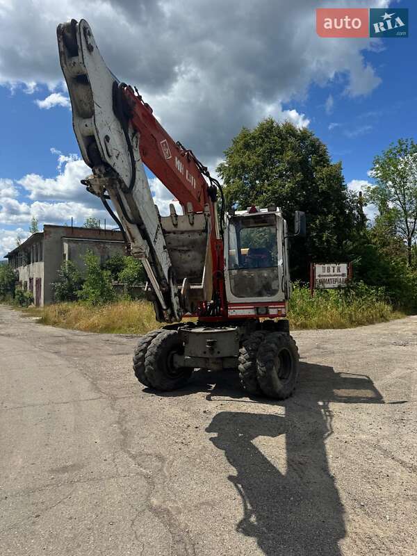 Екскаватор навантажувач O&K A30 1993 в 