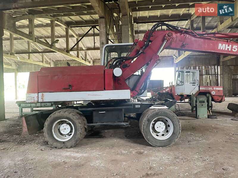 Екскаватор навантажувач O&K MH 5 1993 в Чинадієвому